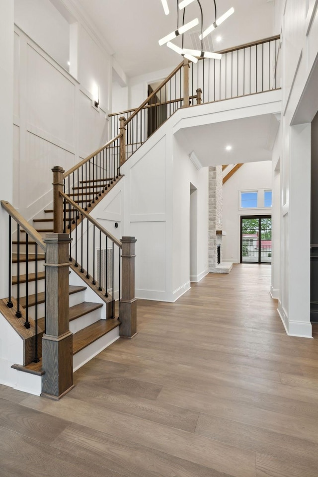 512 Wilson Pike, Brentwood, TN 37027 - staircase with a high ceiling and wood finished floors