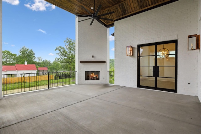 512 Wilson Pike, Brentwood, TN 37027 - view of patio / terrace featuring a warm lit fireplace