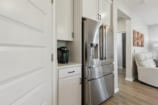 3225 Brookberry Ln, Murfreesboro, TN 37129 - kitchen featuring stainless steel fridge, light wood-style floors, and white cabinets