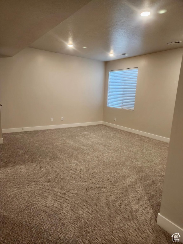 9786 N Aaron Ave E Unit 221, Eagle Mountain, UT 84005 - carpeted spare room featuring baseboards, visible vents, and recessed lighting