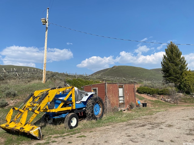 2406 Smokey Canyon Rd, Auburn, WY 83111 - view of jungle gym with a mountain view