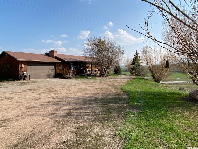 view of yard with a garage
