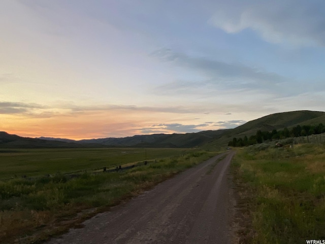 2406 Smokey Canyon Rd, Auburn, WY 83111 - view of street with a mountain view and a rural view
