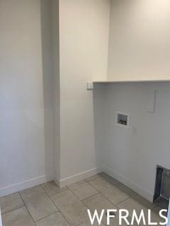 5508 W Victory Lap Ct S Unit 113, West Valley City, UT 84120 - washroom featuring light tile floors