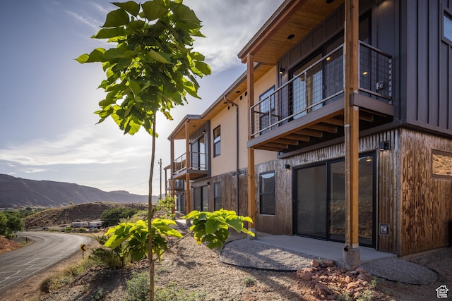 1185 S Murphy Ln Unit 105D, Moab, UT 84532 - view of property exterior with a mountain view and a balcony