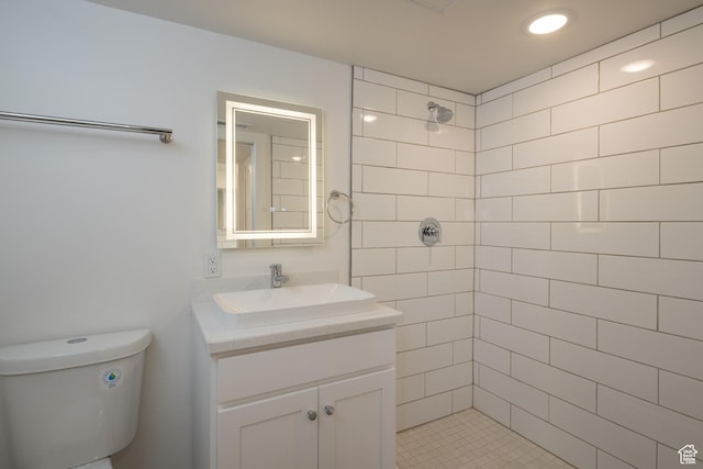 1185 S Murphy Ln Unit 105D, Moab, UT 84532 - full bathroom with tiled shower, vanity, and toilet