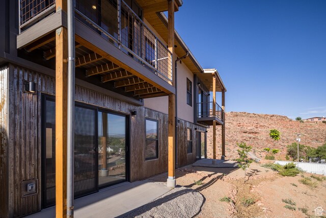 1185 S Murphy Ln Unit 106B, Moab, UT 84532 - property entrance with a balcony and a patio