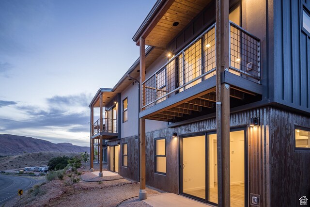 1185 S Murphy Ln Unit 106B, Moab, UT 84532 - rear view of property with a balcony, a mountain view, and a patio area