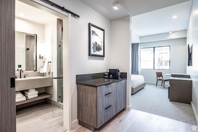 2417 W High Mountain Rd Unit 2109, Park City, UT 84098 - bathroom with hardwood / wood-style floors, vanity, and an enclosed shower