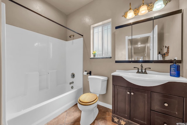 full bathroom with shower / tub combination, toilet, tile flooring, and vanity