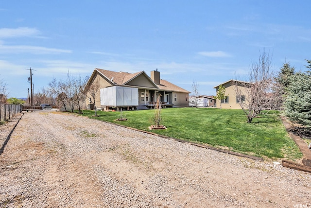 view of front of house with a front lawn