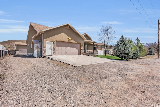 view of front of property featuring a garage