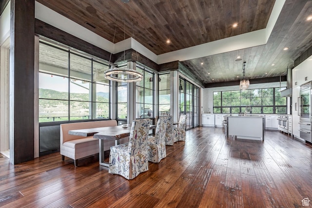 sunroom featuring a sink and plenty of natural light