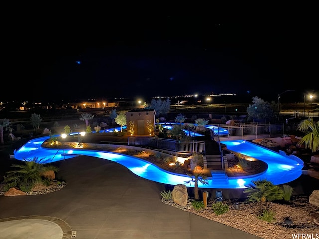 3210 S Dyami Vw Unit 60, Hurricane, UT 84737 - pool at night with a patio area