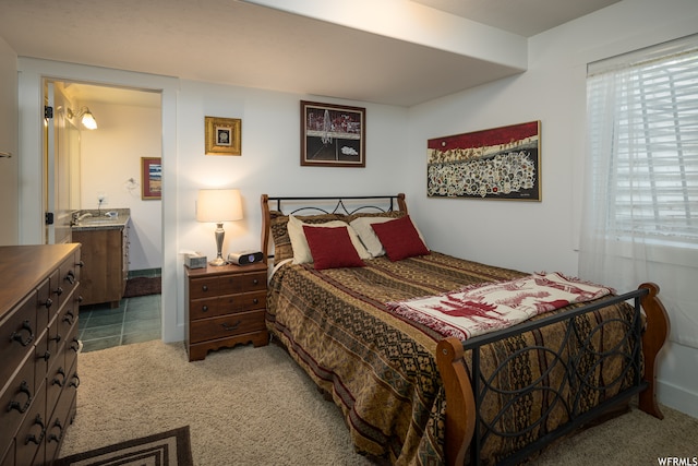 487 Kiva Dr, Moab, UT 84532 - bedroom with sink and dark carpet