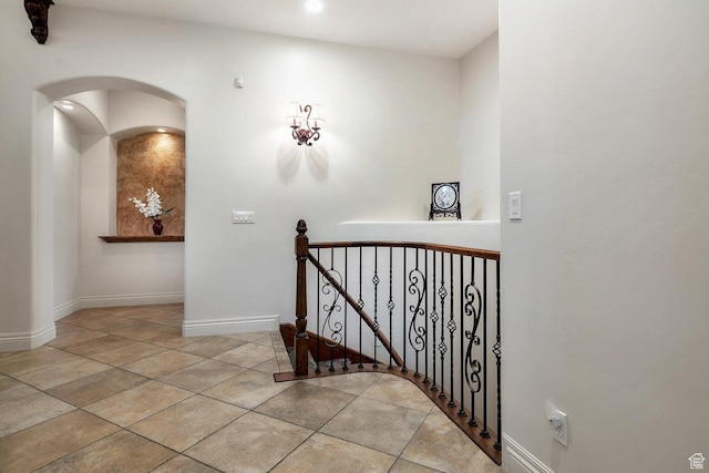 hallway with light tile patterned flooring