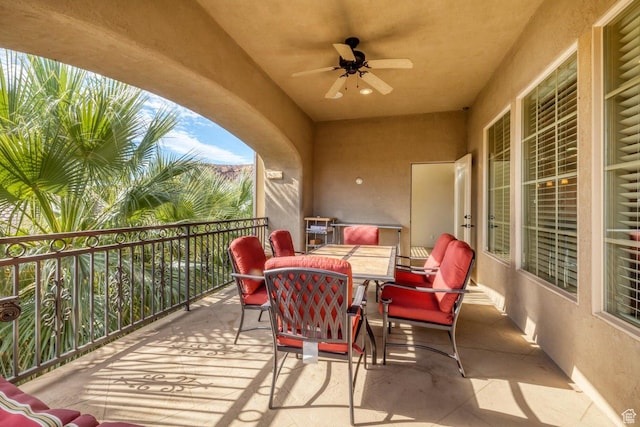 balcony featuring ceiling fan