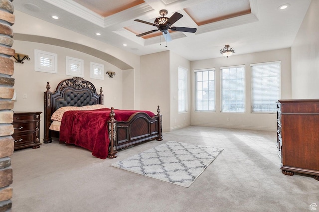 carpeted bedroom with coffered ceiling, beamed ceiling, crown molding, and ceiling fan