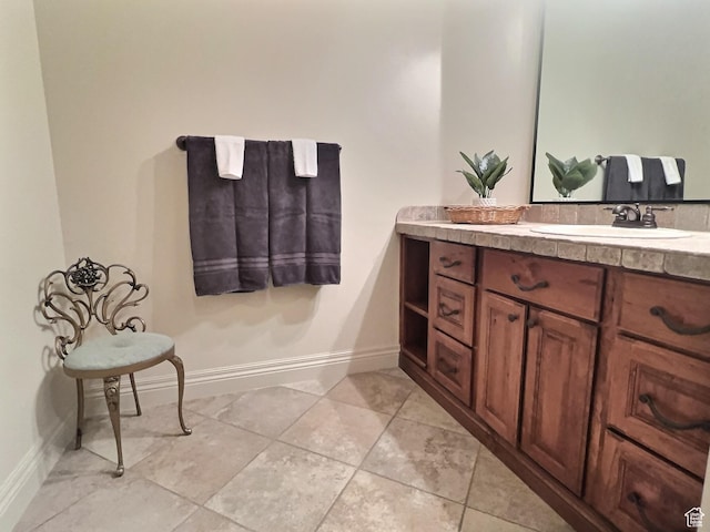 bathroom with vanity and tile patterned floors