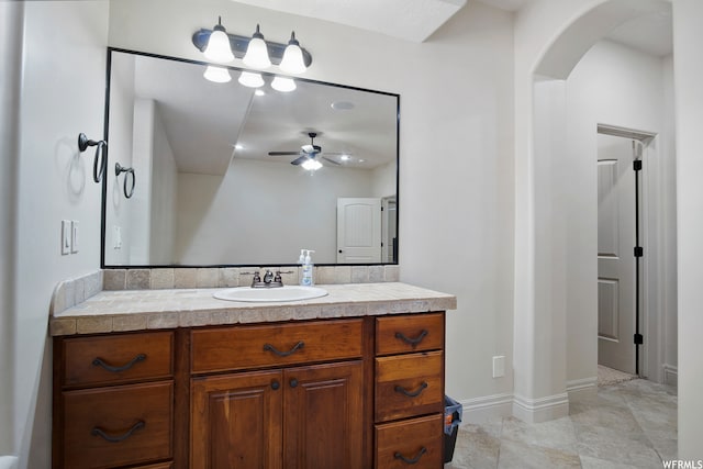 bathroom with vanity and ceiling fan