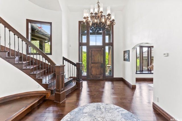 4159 Moose Hollow Rd, Park City, UT 84098 - foyer entrance with an inviting chandelier, dark hardwood / wood-style floors, and a high ceiling