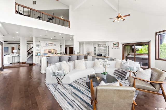 4159 Moose Hollow Rd, Park City, UT 84098 - living room with beamed ceiling, ceiling fan, dark hardwood / wood-style floors, high vaulted ceiling, and built in shelves