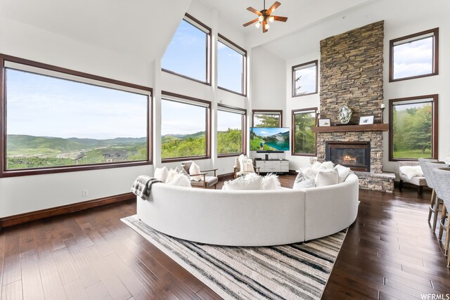 4159 Moose Hollow Rd, Park City, UT 84098 - living room featuring plenty of natural light, ceiling fan, a fireplace, and dark hardwood / wood-style floors