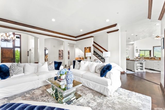 4159 Moose Hollow Rd, Park City, UT 84098 - living room with crown molding, ceiling fan with notable chandelier, and hardwood / wood-style flooring