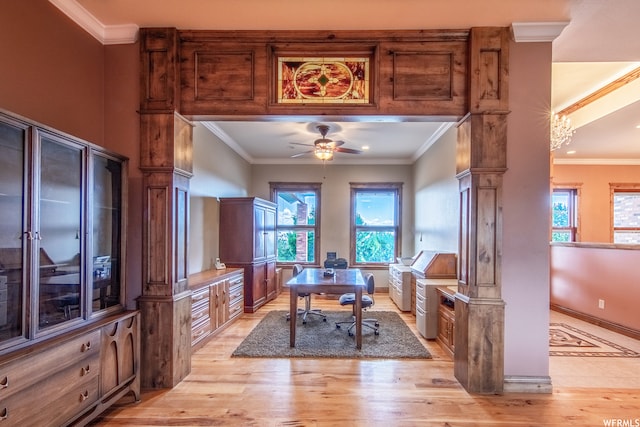 office space with light hardwood / wood-style floors, decorative columns, ceiling fan, and crown molding