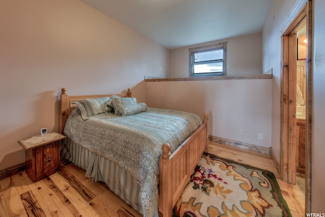 bedroom featuring light hardwood / wood-style floors