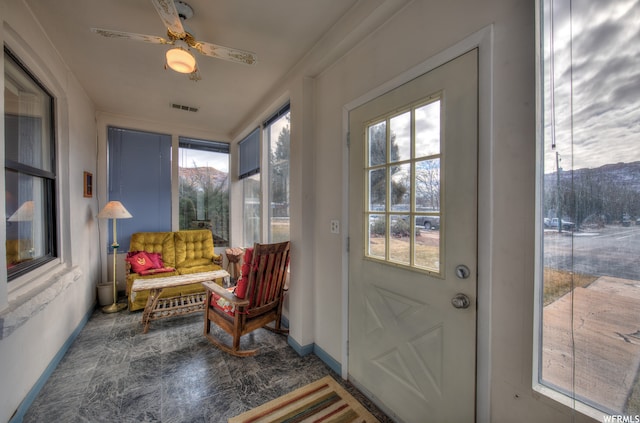 195 E 200 N, Moab, UT 84532 - sunroom featuring a mountain view and baseboards