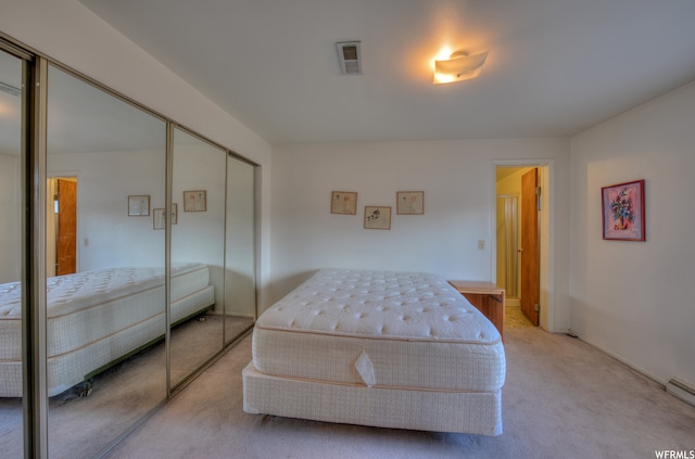 195 E 200 N, Moab, UT 84532 - bedroom featuring light carpet and a closet