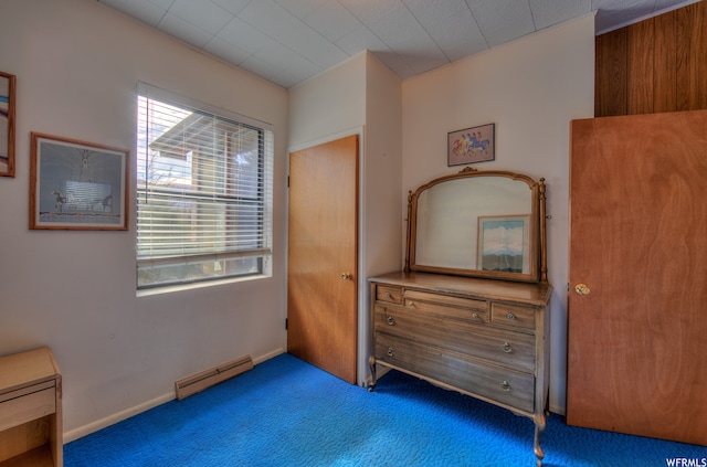 195 E 200 N, Moab, UT 84532 - unfurnished bedroom with a baseboard heating unit and carpet