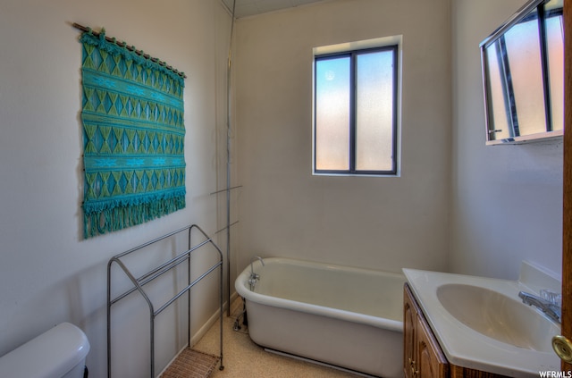 195 E 200 N, Moab, UT 84532 - bathroom with a freestanding bath and vanity