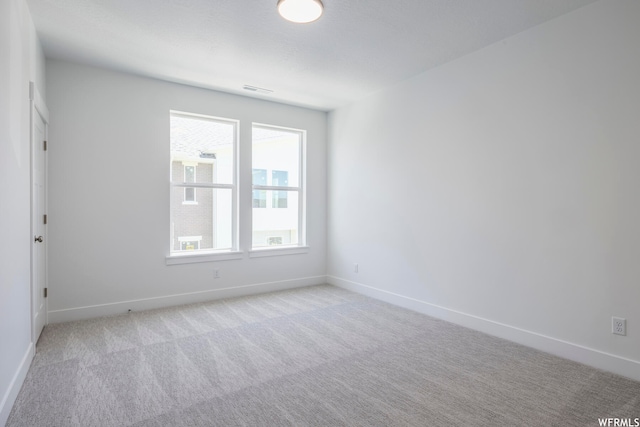1025 S 2770 E, Spanish Fork, UT 84660 - unfurnished room with a wealth of natural light and light carpet