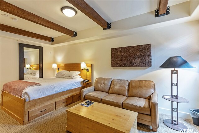 1456 Newpark Blvd Unit 422, Park City, UT 84098 - bedroom featuring carpet floors and beamed ceiling