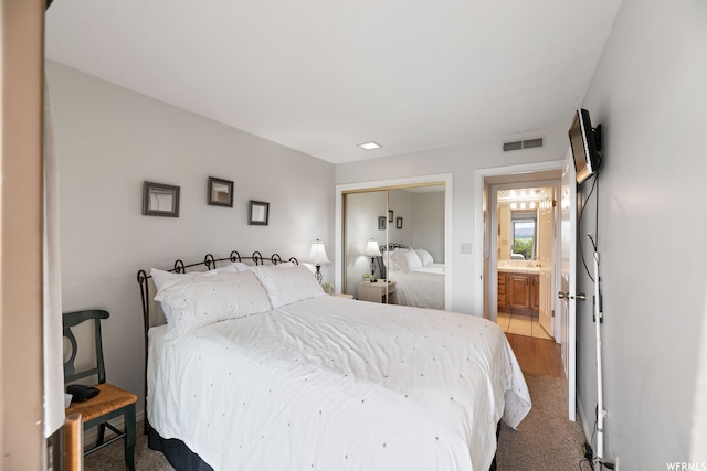 1845 W Canyon Dr Unit 304, St George, UT 84770 - tiled bedroom with connected bathroom and a closet