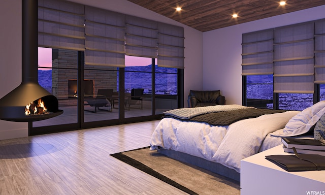 7932 Red Tail Ct, Park City, UT 84060 - bedroom featuring vaulted ceiling, access to outside, light hardwood / wood-style flooring, wood ceiling, and a wood stove
