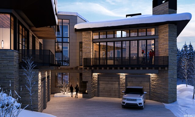 7932 Red Tail Ct, Park City, UT 84060 - snow covered property featuring a garage