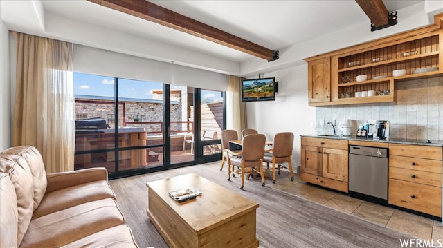 1476 Newpark Blvd Unit 204, Park City, UT 84098 - interior space with beamed ceiling, stainless steel dishwasher, light tile floors, backsplash, and sink