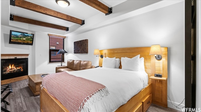 1476 Newpark Blvd Unit 204, Park City, UT 84098 - bedroom featuring dark wood-type flooring and beamed ceiling