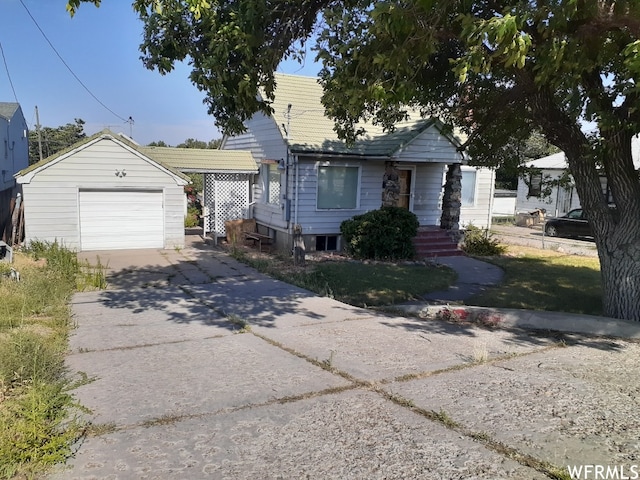 1703 N Main St, Sunset, UT 84015 - bungalow-style home featuring a garage