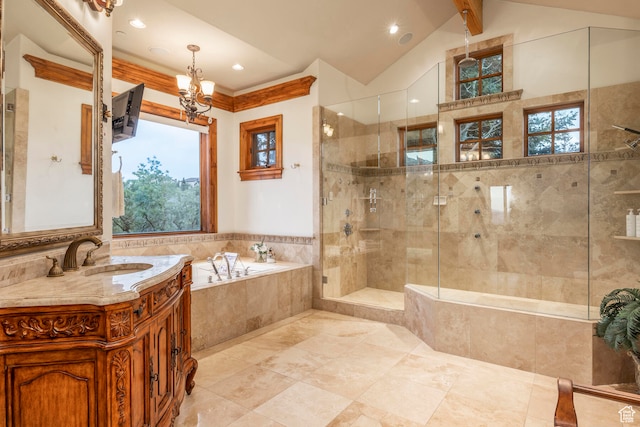 bathroom featuring vanity, an inviting chandelier, plus walk in shower, and vaulted ceiling