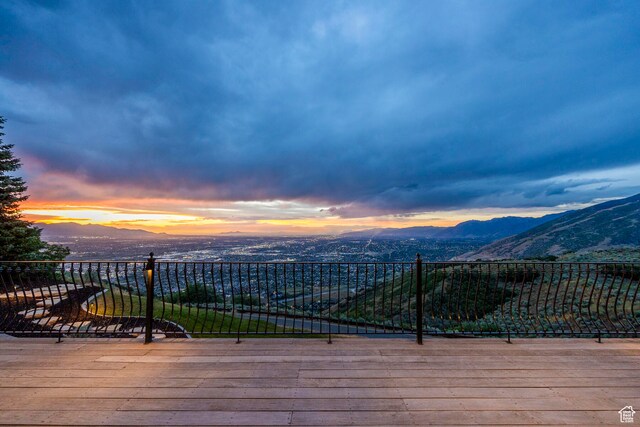 deck at dusk with a mountain view