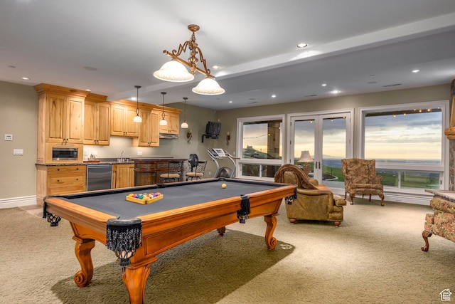 game room featuring wet bar, light carpet, and billiards