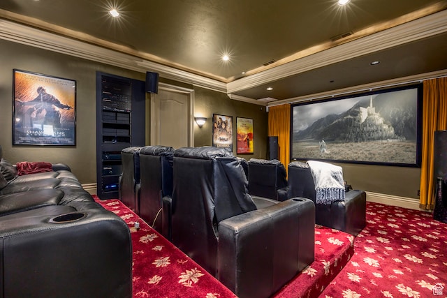 cinema featuring ornamental molding and carpet flooring