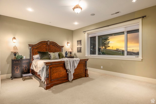 bedroom with light carpet