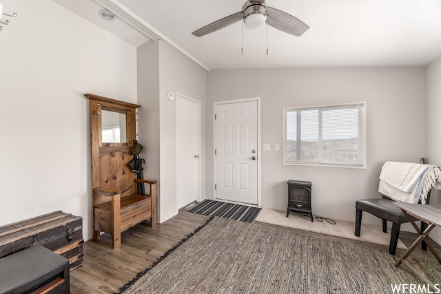 29665 N 9000 E, Fairview, UT 84629 - interior space featuring ceiling fan, vaulted ceiling, a wood stove, and dark hardwood / wood-style flooring