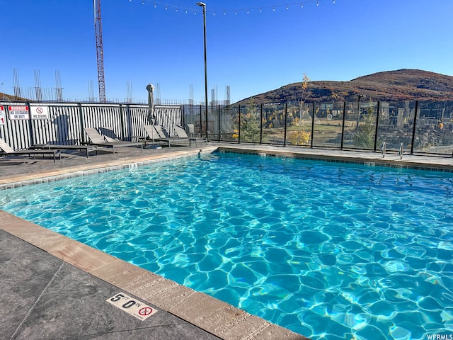909 W Peace Tree Trl Unit 601, Heber City, UT 84032 - community pool featuring a mountain view