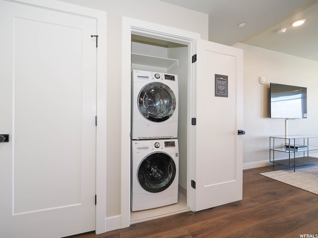 909 W Peace Tree Trl Unit 601, Heber City, UT 84032 - laundry area with laundry area, baseboards, dark wood finished floors, and stacked washer / drying machine